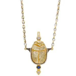 18K Yellow Gold Necklace: 3000 Yr. Old Scarab set in 22K Yellow Gold Frame w/Diamonds and Sapphire Accents