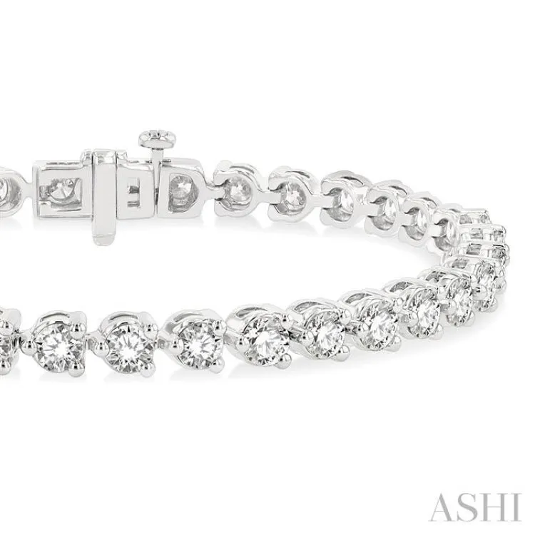 7 Ctw Tri-Prong Round Cut Diamond Tennis Bracelet in 14K White Gold