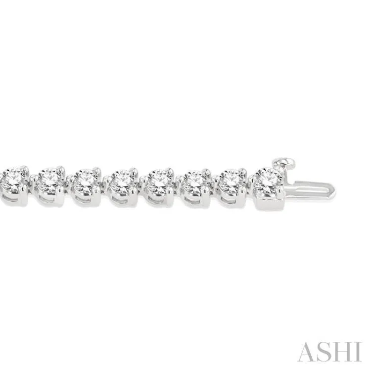 7 Ctw Tri-Prong Round Cut Diamond Tennis Bracelet in 14K White Gold