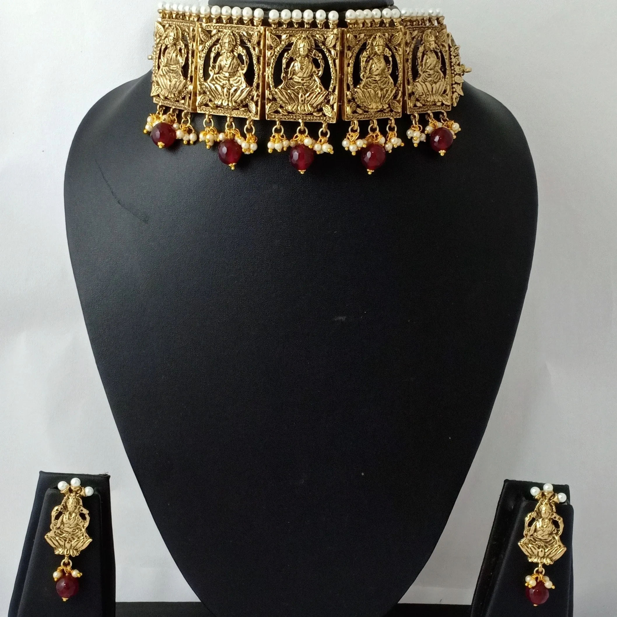 Estele Gold Plated Antique Laxmi Designer Choker Necklace Set with Ruby Beads & Pearls for Women