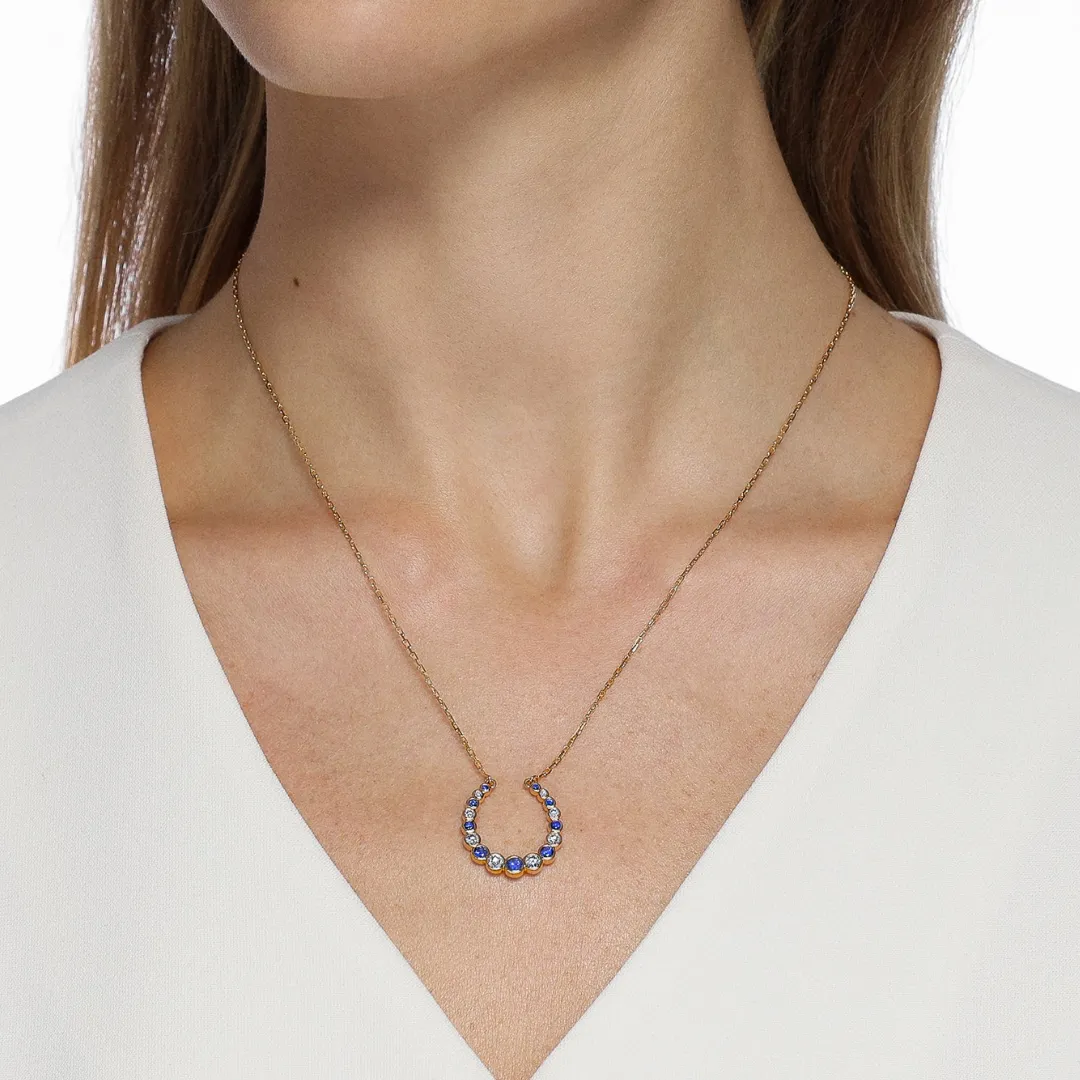 Graduated Bezel Sapphire & Diamond Horseshoe Pendant Necklace