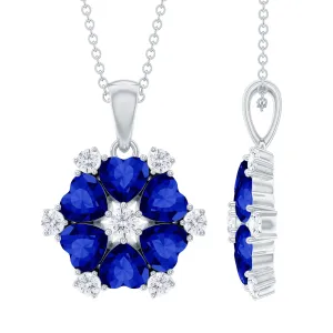 Heart Shape Created Blue Sapphire and Diamond Flower Pendant