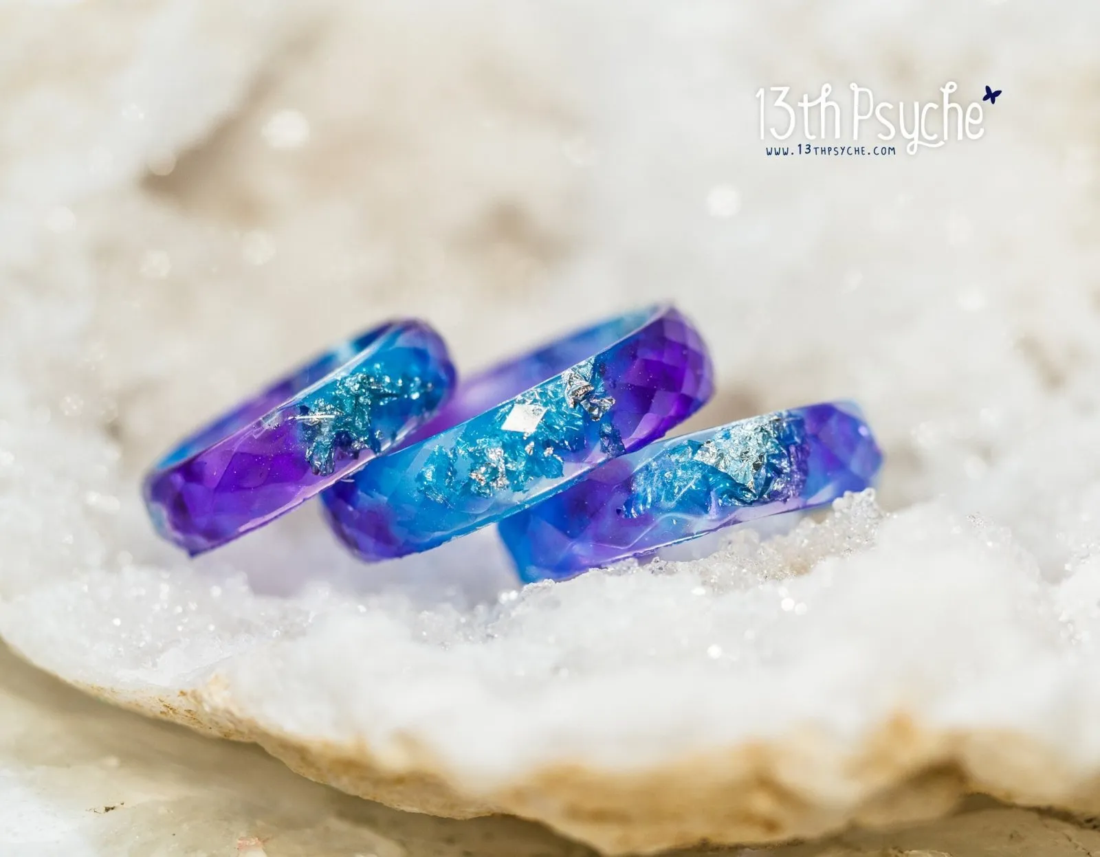 Purple and blue faceted resin ring with silver flakes