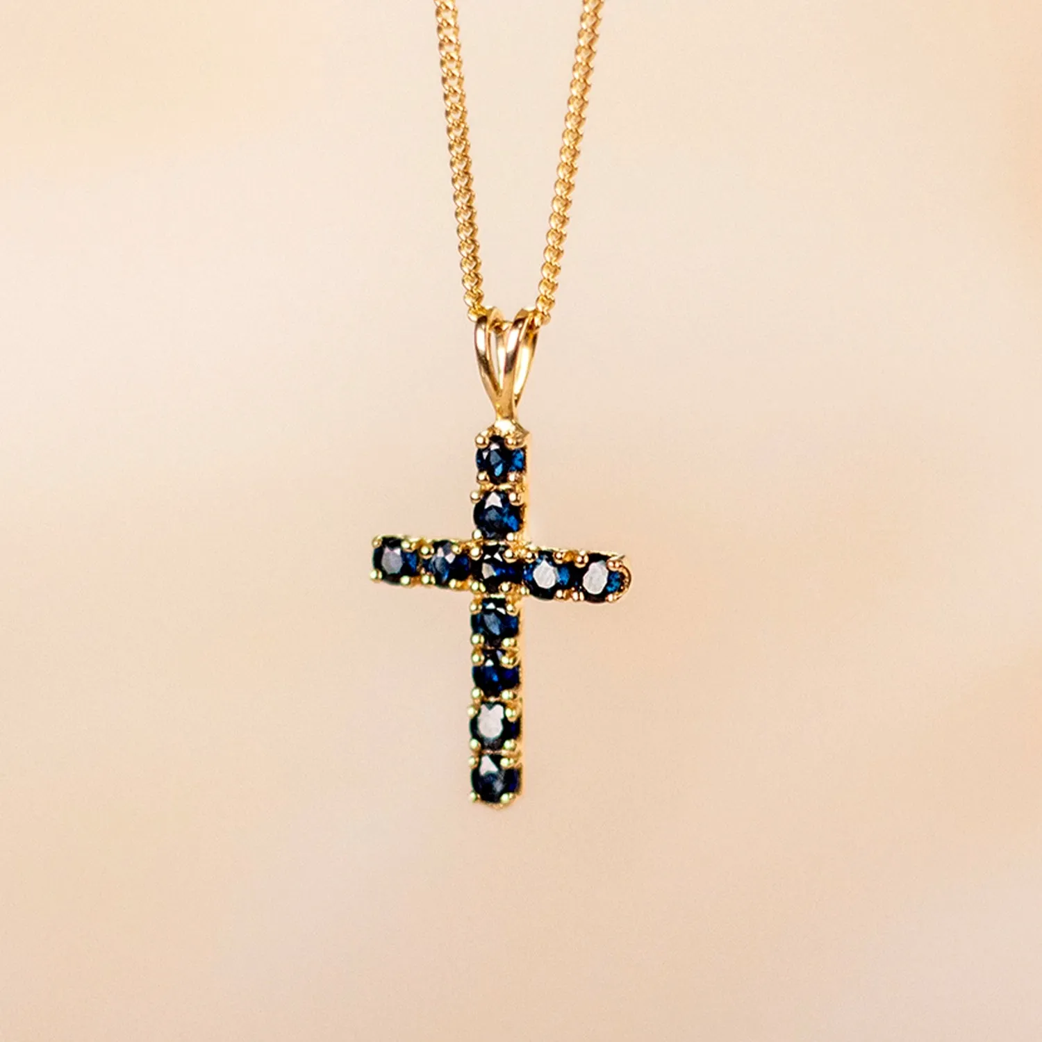 Sapphire Cross Necklace in Solid Gold