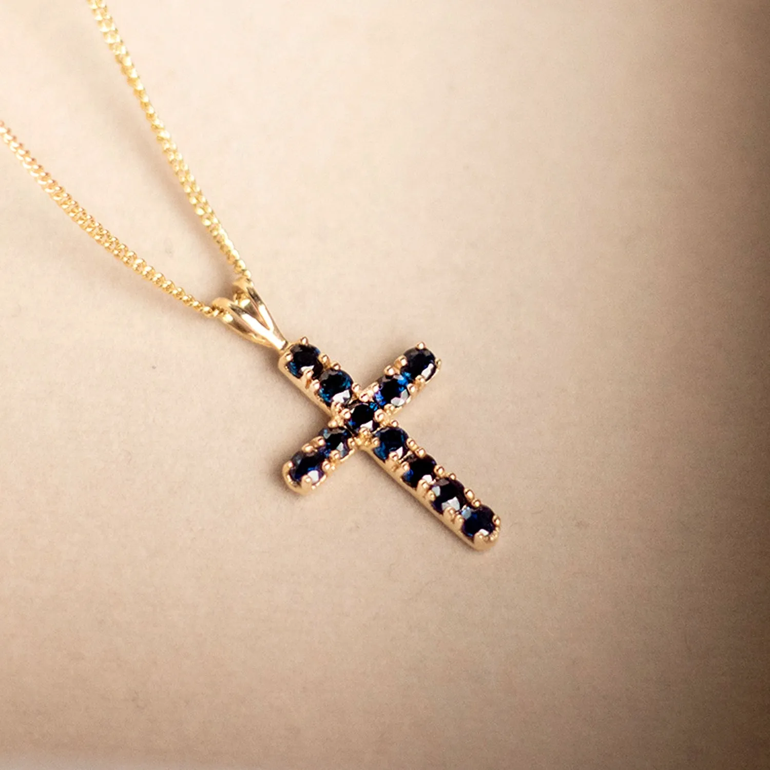 Sapphire Cross Necklace in Solid Gold