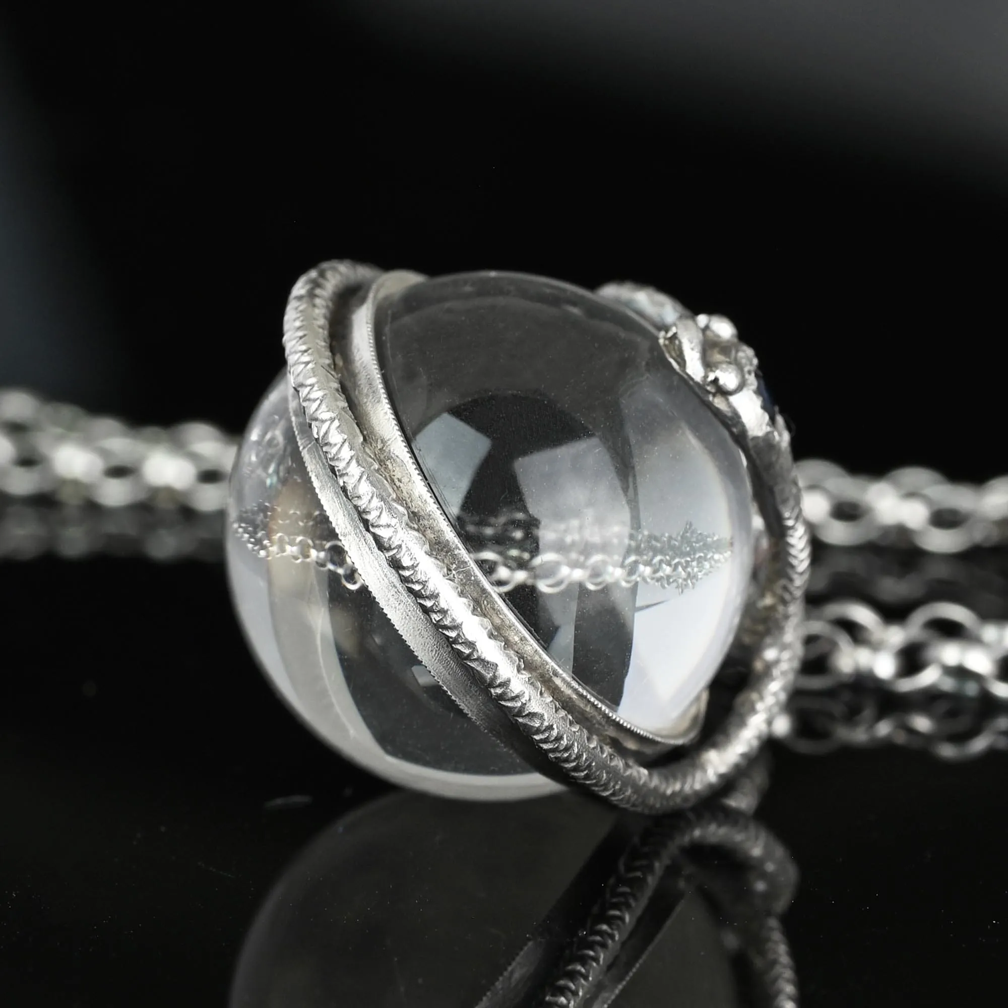 Silver Sapphire Pools of Light Rock Crystal Snake Necklace